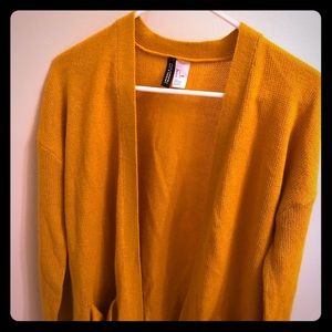 Mustard cardigan.